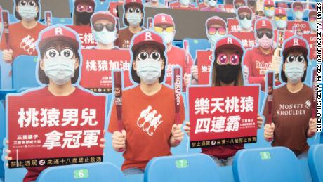 Cardboard cutouts of fans filled parts of the stadium for Saturday&#39;s washed-out baseball game. 