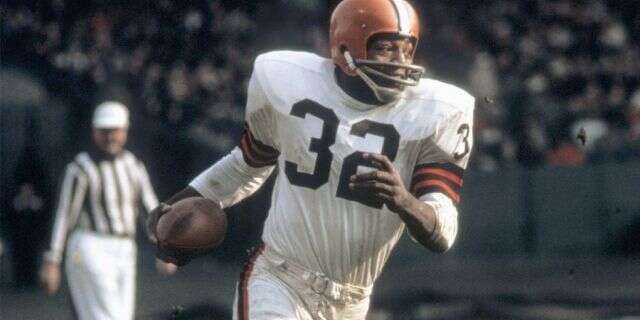 Running back Jim Brown #32 of the Cleveland Browns runs with the ball during a game in the 1960's at Municipal Stadium in Cleveland, Ohio. (Photo by: Tony Tomsic/Getty Images)