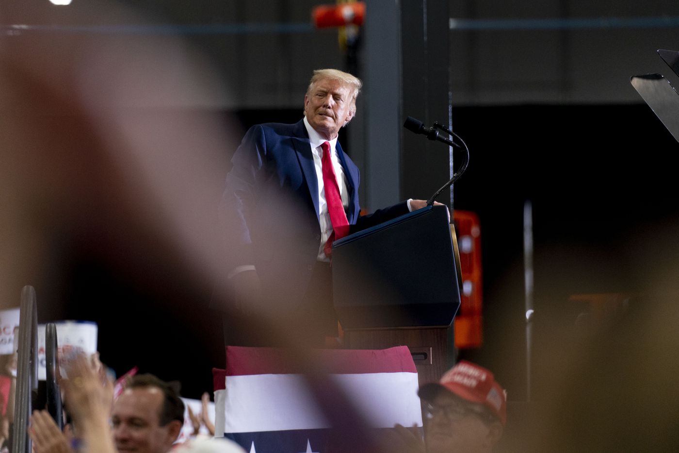 President Donald Trump pauses while speaking at a rally at Xtreme Manufacturing, Sunday, Sept. 13, 2020, in Henderson, Nev.