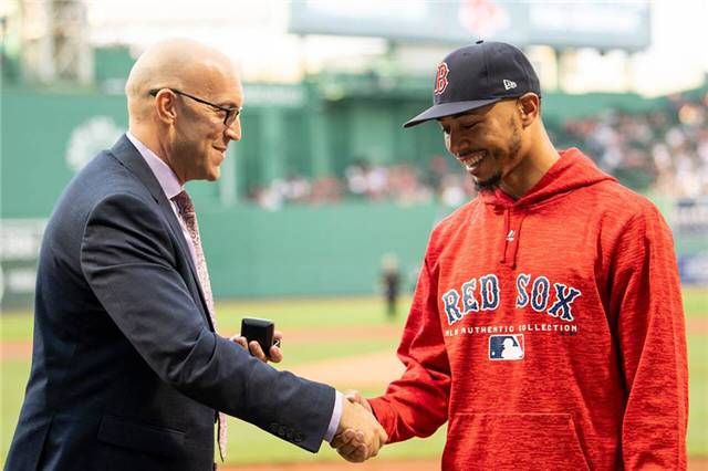 PBA commissioner Tom Clark presents Mookie Betts with a PBA 300 ring for rolling a perfect game in a PBA event. (Courtesy of the PBA) 