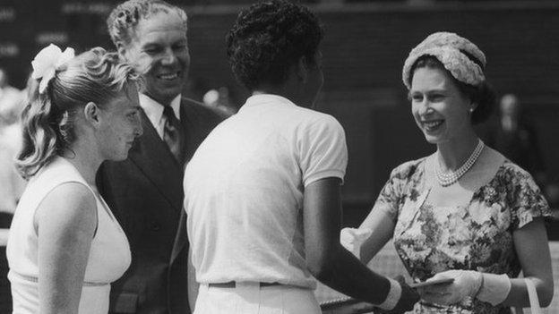 Althea Gibson shakes hands with Queen Elizabeth after winning the Wimbledon ladies' singles in 1957